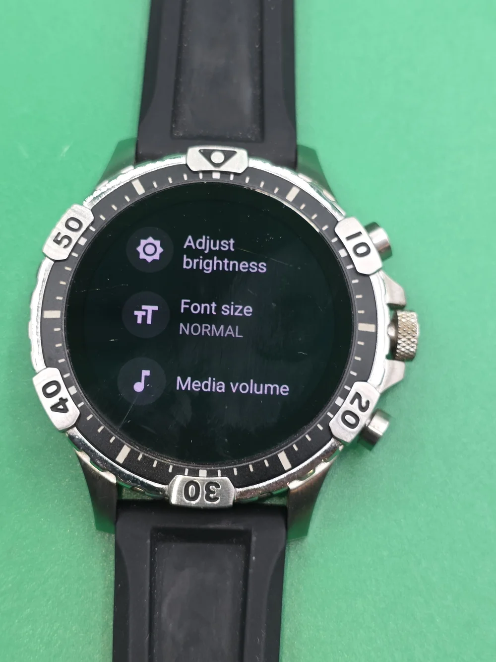 Fossil Gen 5 Garrett HR smartwatch with a black silicone strap